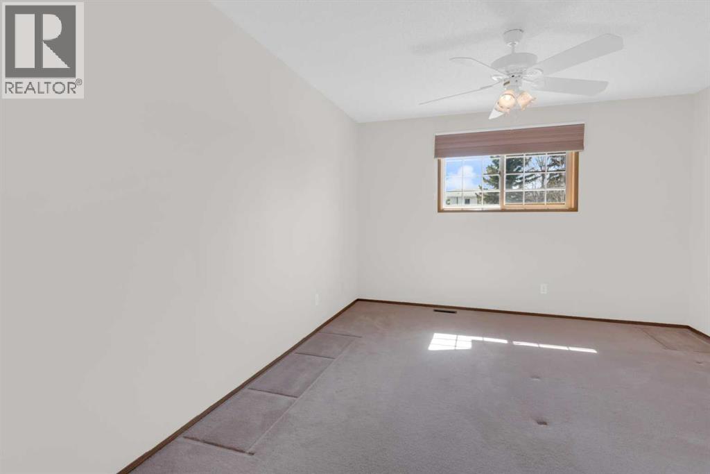 216 Shawinigan Drive SW, Calgary, Alberta  T2Y 3B4 - Photo 17 - A2309802