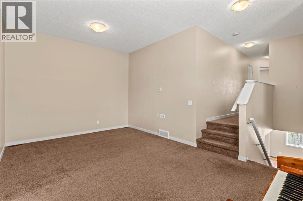 514 River Heights Crescent, Cochrane, Alberta  T4C 0T8 - Photo 13 - A2312891