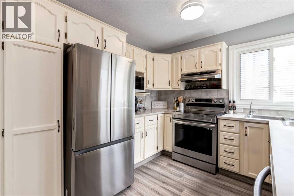 133 Sandpiper Circle Nw, Calgary, Alberta T3K 3R4 - Photo 5 - A2314037