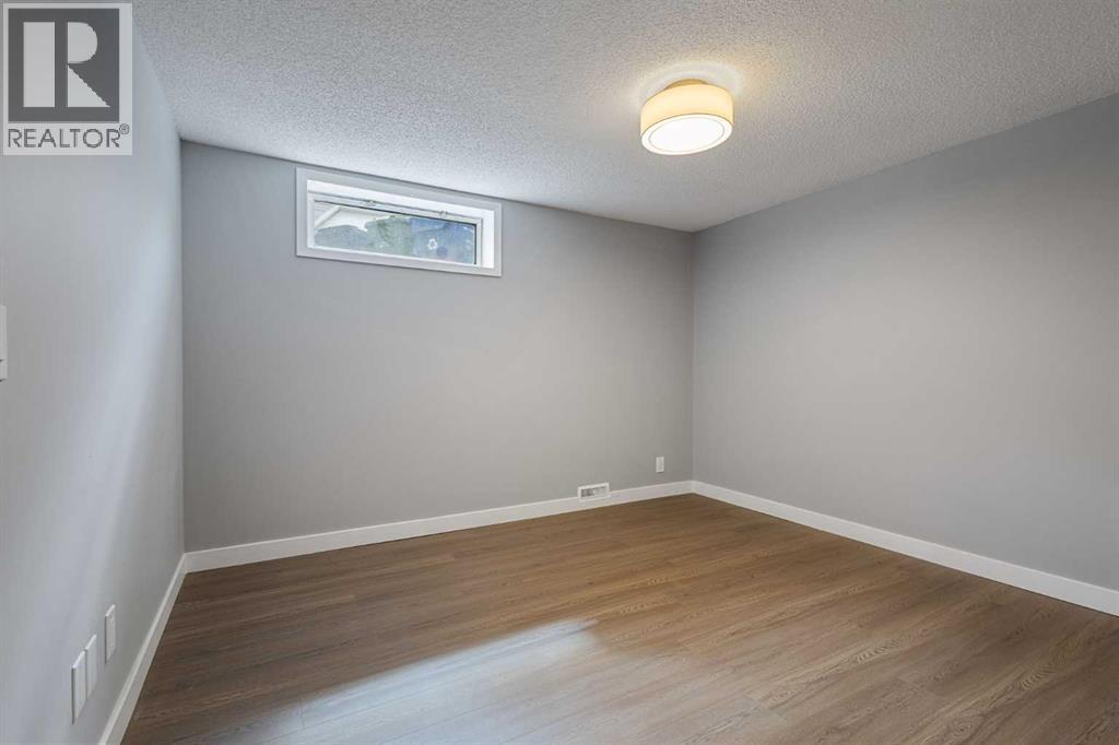 5876 Dalcastle Drive Nw, Calgary, Alberta  T3A 2B6 - Photo 27 - A2313700