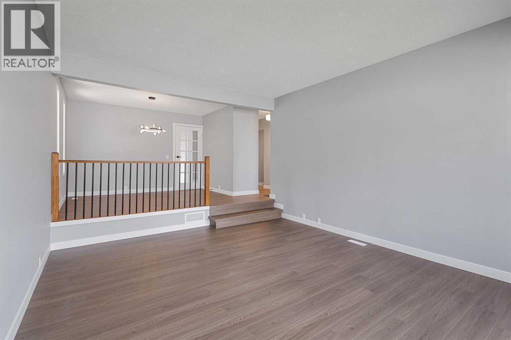 5876 Dalcastle Drive Nw, Calgary, Alberta  T3A 2B6 - Photo 11 - A2313700
