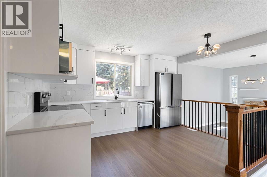 5876 Dalcastle Drive Nw, Calgary, Alberta  T3A 2B6 - Photo 14 - A2313700