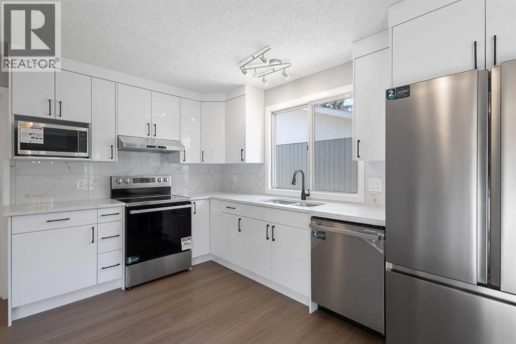 5876 Dalcastle Drive Nw, Calgary, Alberta  T3A 2B6 - Photo 3 - A2313700