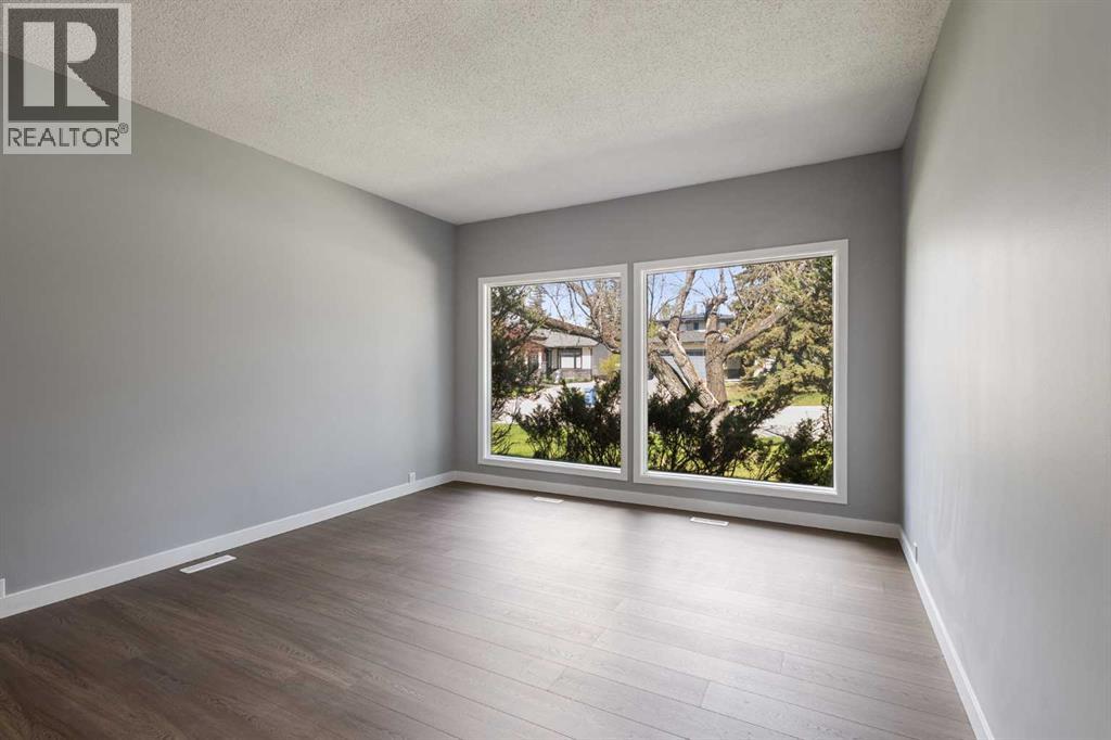 5876 Dalcastle Drive Nw, Calgary, Alberta  T3A 2B6 - Photo 10 - A2313700