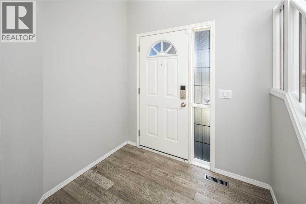 32 Cougarstone Square SW, Calgary, Alberta  T3H 5J4 - Photo 5 - A2301938
