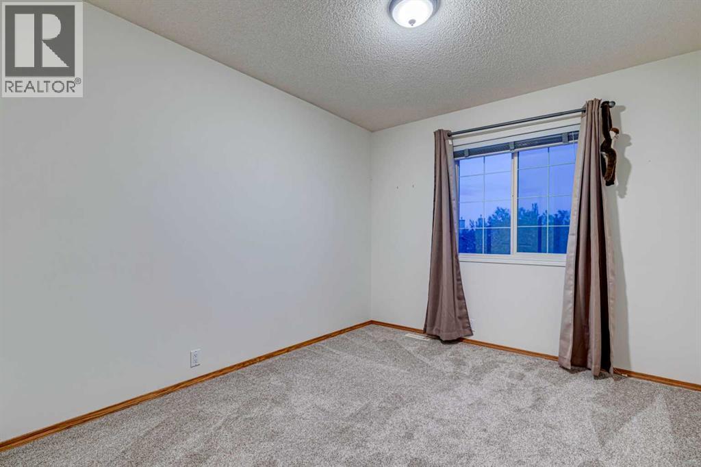 268 Mt Brewster Circle SE, Calgary, Alberta  t2z 3j2 - Photo 35 - A2312971