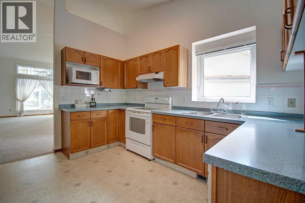 345 Sandringham Court NW, Calgary, Alberta  T3K 3V6 - Photo 14 - A2314042