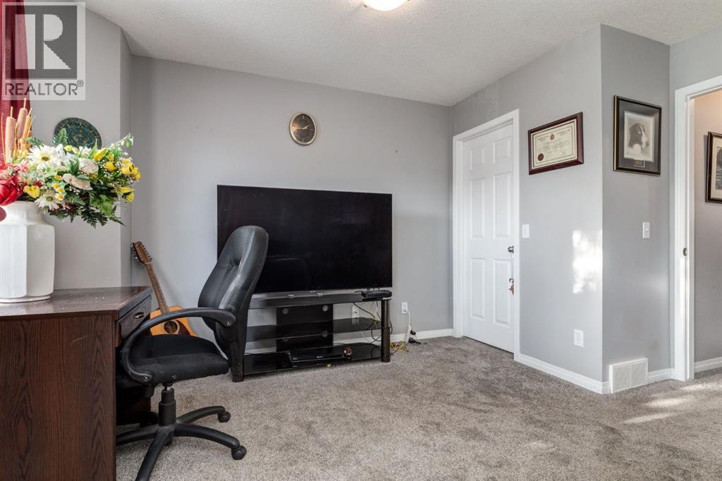 102 Cimarron Trail, Okotoks, Alberta  T1S 2G9 - Photo 16 - A2314001