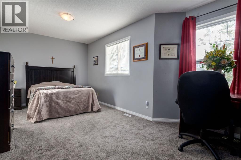 102 Cimarron Trail, Okotoks, Alberta  T1S 2G9 - Photo 17 - A2314001