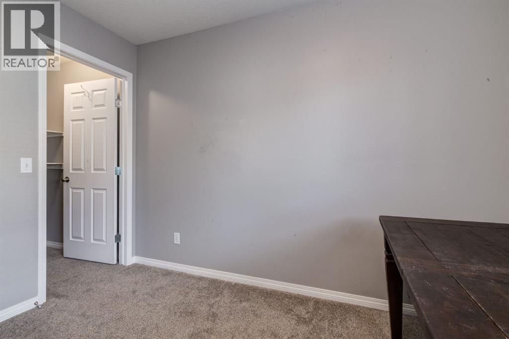 102 Cimarron Trail, Okotoks, Alberta  T1S 2G9 - Photo 18 - A2314001
