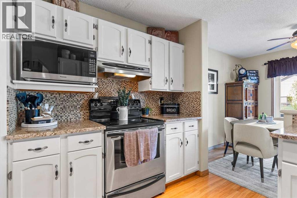 158 Saratoga Close NE, Calgary, Alberta  T1Y 7A1 - Photo 6 - A2312096