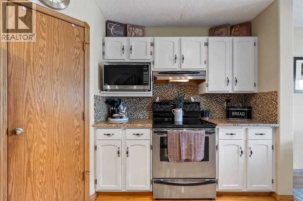 158 Saratoga Close NE, Calgary, Alberta  T1Y 7A1 - Photo 7 - A2312096