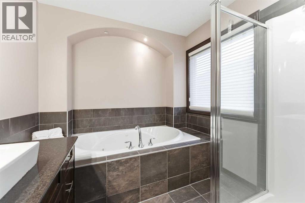 225 Panamount Road, Calgary, Alberta  T3K 0H9 - Photo 25 - A2314125