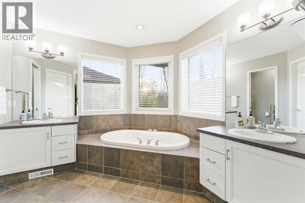 74 Evercreek Bluffs Road SW, Calgary, Alberta  T2Y 4P2 - Photo 24 - A2313689