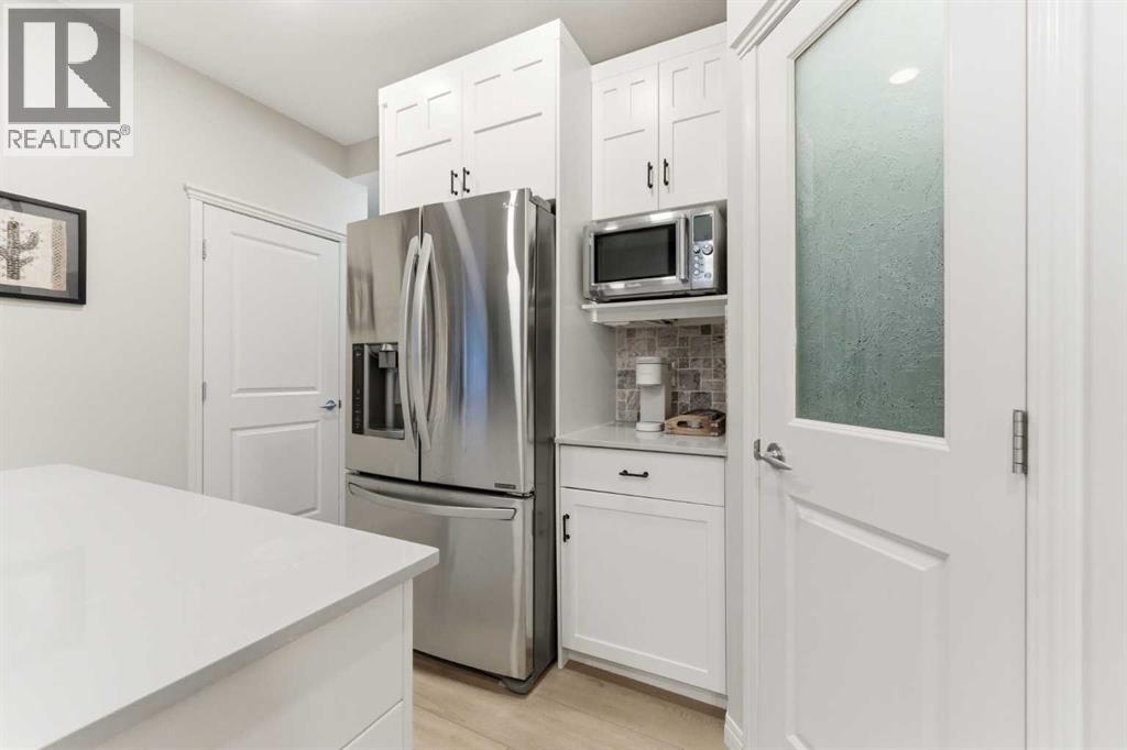 74 Evercreek Bluffs Road SW, Calgary, Alberta  T2Y 4P2 - Photo 15 - A2313689