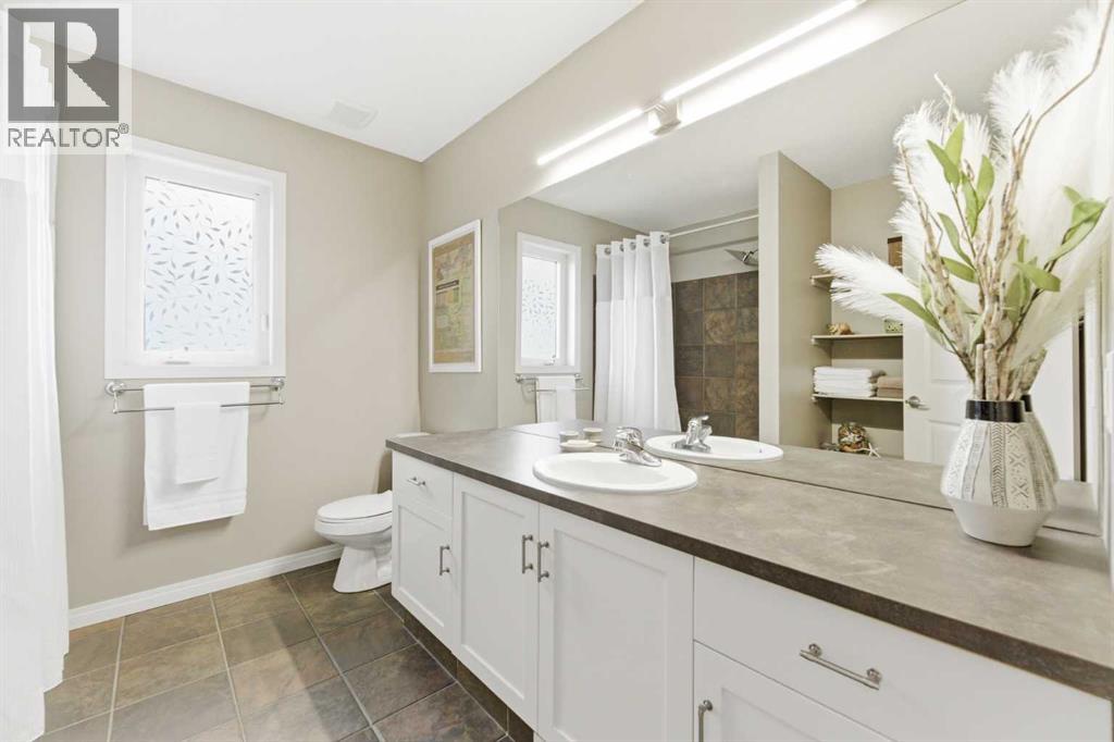 74 Evercreek Bluffs Road SW, Calgary, Alberta  T2Y 4P2 - Photo 30 - A2313689