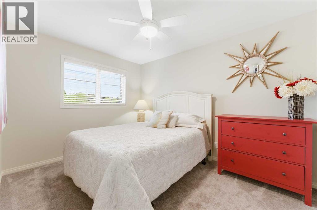 74 Evercreek Bluffs Road SW, Calgary, Alberta  T2Y 4P2 - Photo 28 - A2313689