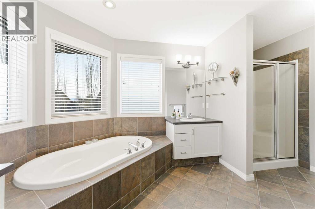 74 Evercreek Bluffs Road SW, Calgary, Alberta  T2Y 4P2 - Photo 25 - A2313689