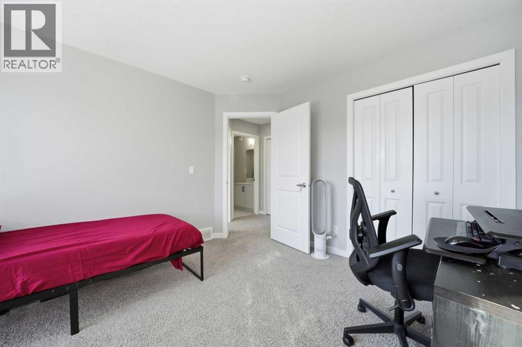 704 Creekstone Circle SW, Calgary, Alberta  T2X 4Y6 - Photo 28 - A2286641
