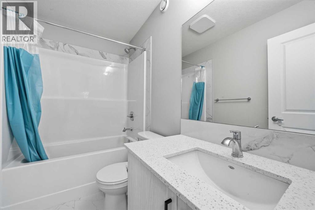 704 Creekstone Circle SW, Calgary, Alberta  T2X 4Y6 - Photo 25 - A2286641