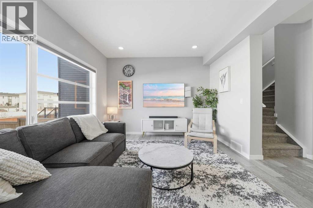 704 Creekstone Circle SW, Calgary, Alberta  T2X 4Y6 - Photo 4 - A2286641