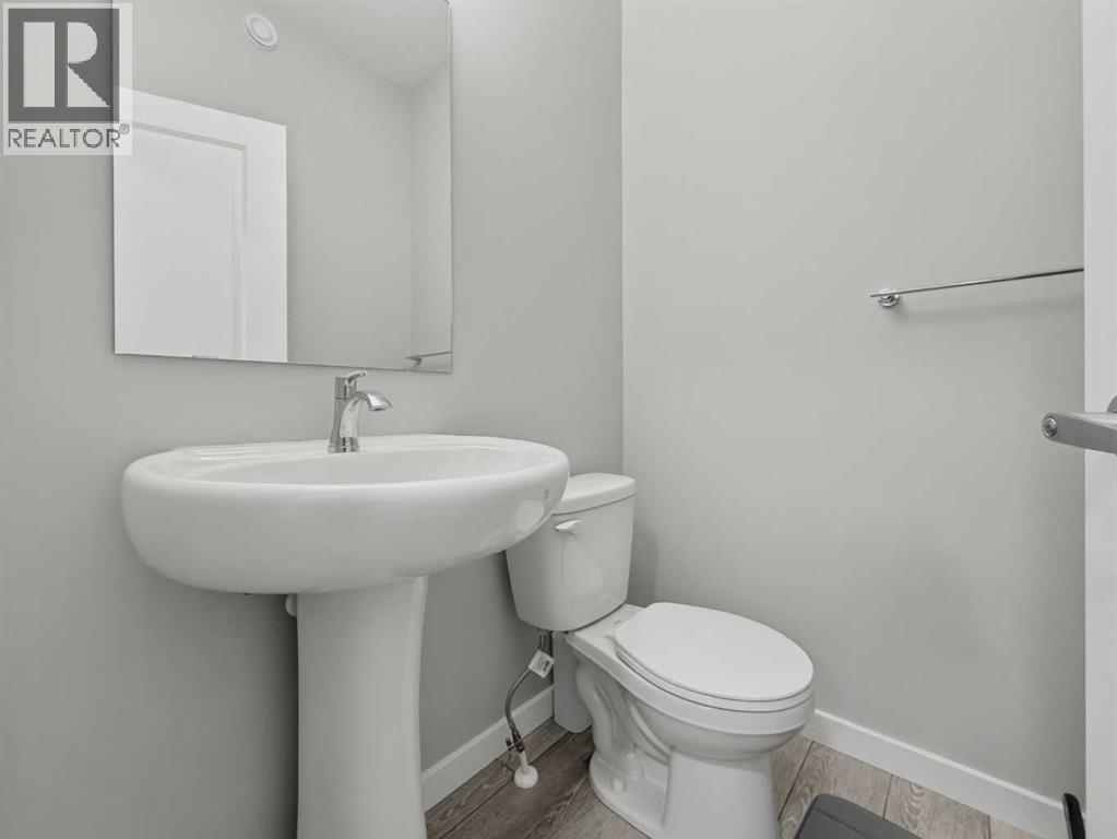 704 Creekstone Circle SW, Calgary, Alberta  T2X 4Y6 - Photo 12 - A2286641