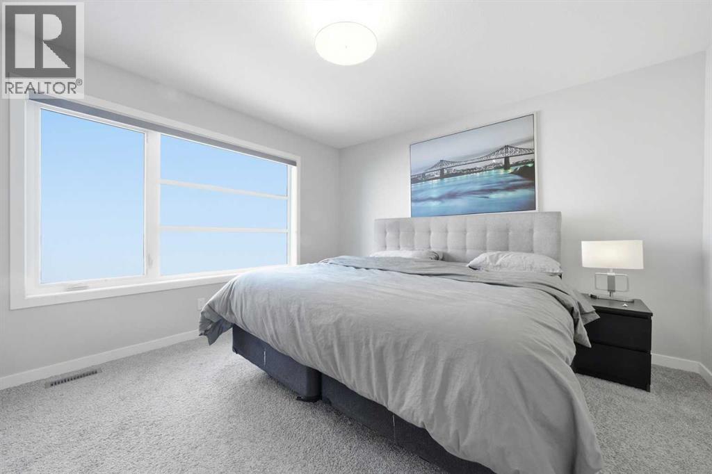 704 Creekstone Circle SW, Calgary, Alberta  T2X 4Y6 - Photo 19 - A2286641