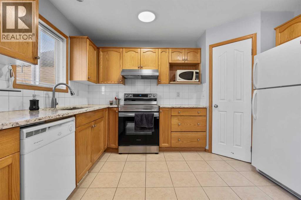 230 Tarawood Close NE, Calgary, Alberta  T3J 4Y9 - Photo 11 - A2313291