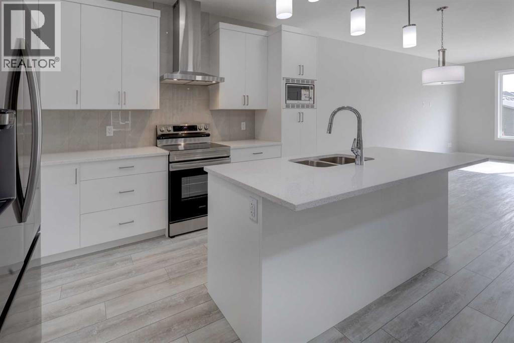 51 Lewisburg Manor Ne, Calgary, Alberta  T3P 2N7 - Photo 8 - A2310893