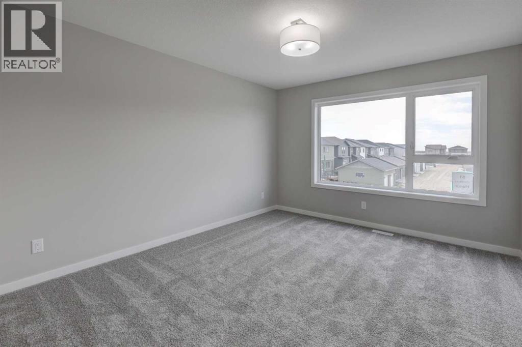 51 Lewisburg Manor Ne, Calgary, Alberta  T3P 2N7 - Photo 14 - A2310893