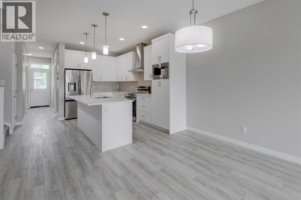 51 Lewisburg Manor Ne, Calgary, Alberta  T3P 2N7 - Photo 6 - A2310893
