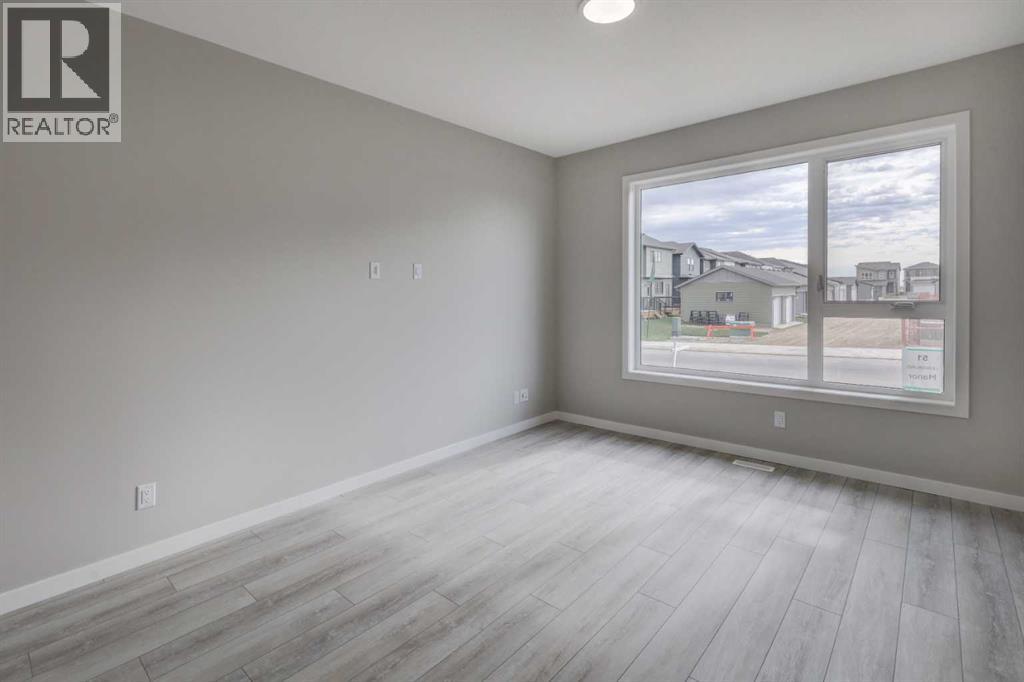 51 Lewisburg Manor Ne, Calgary, Alberta  T3P 2N7 - Photo 3 - A2310893