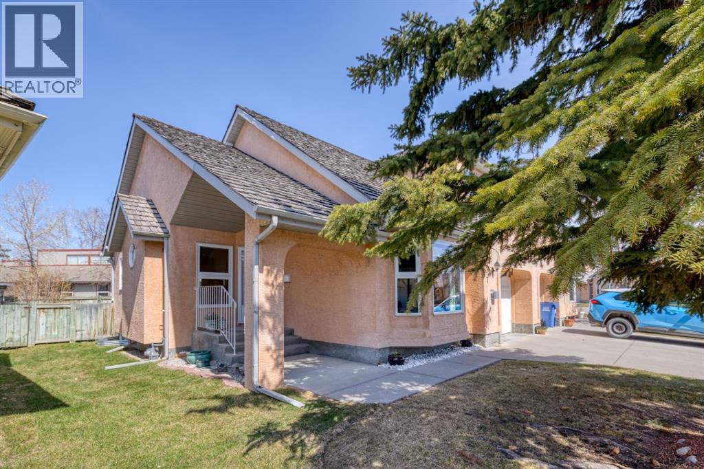 7, 26 Quigley Drive, Cochrane, Alberta  T4C 1M2 - Photo 2 - A2299032