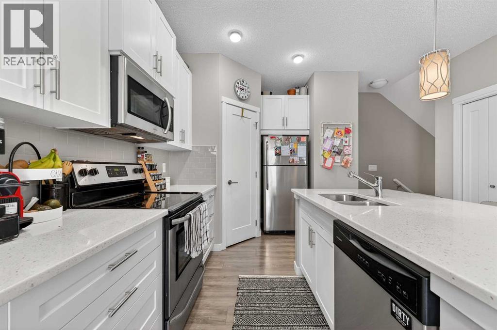 905, 428 Nolan Hill Drive NW, Calgary, Alberta  T3R 0V4 - Photo 7 - A2291618