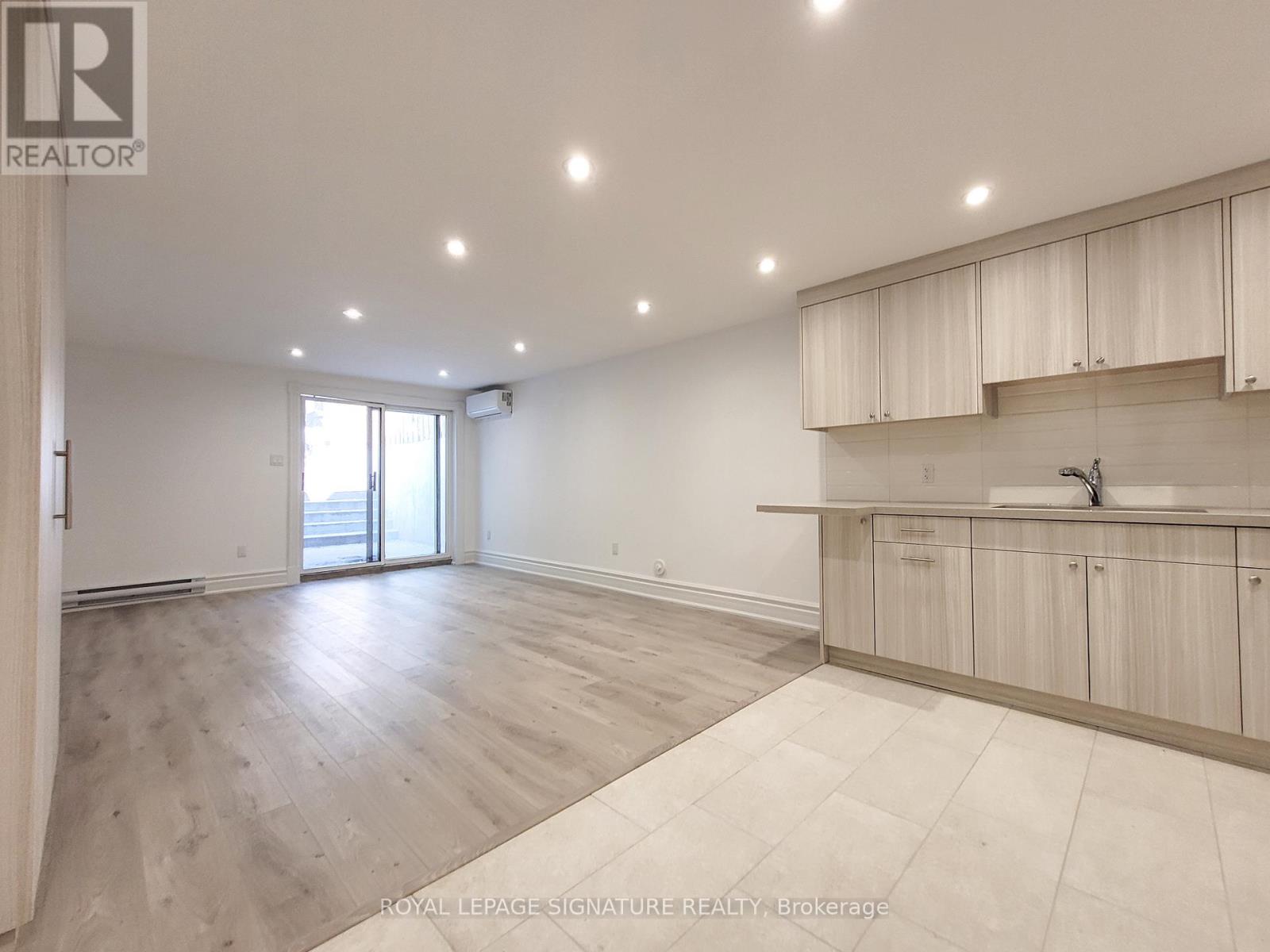 LOWER - 18 COXWELL AVENUE, Toronto, Ontario