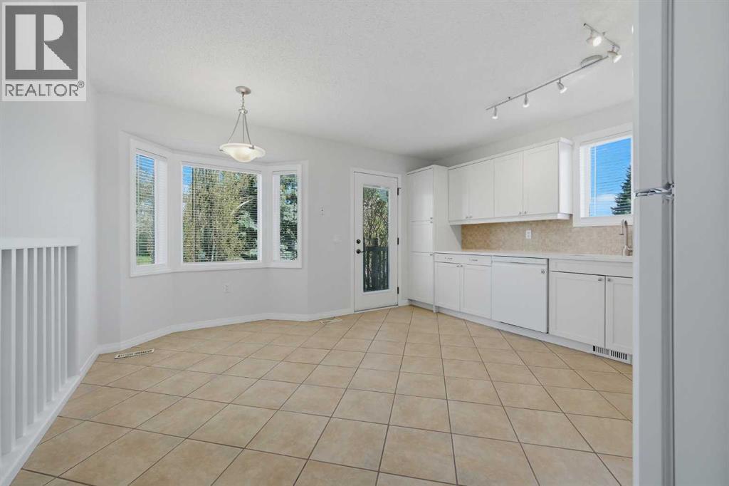 4 Woodstock Road Sw, Calgary, Alberta  T2W 5V8 - Photo 8 - A2312247