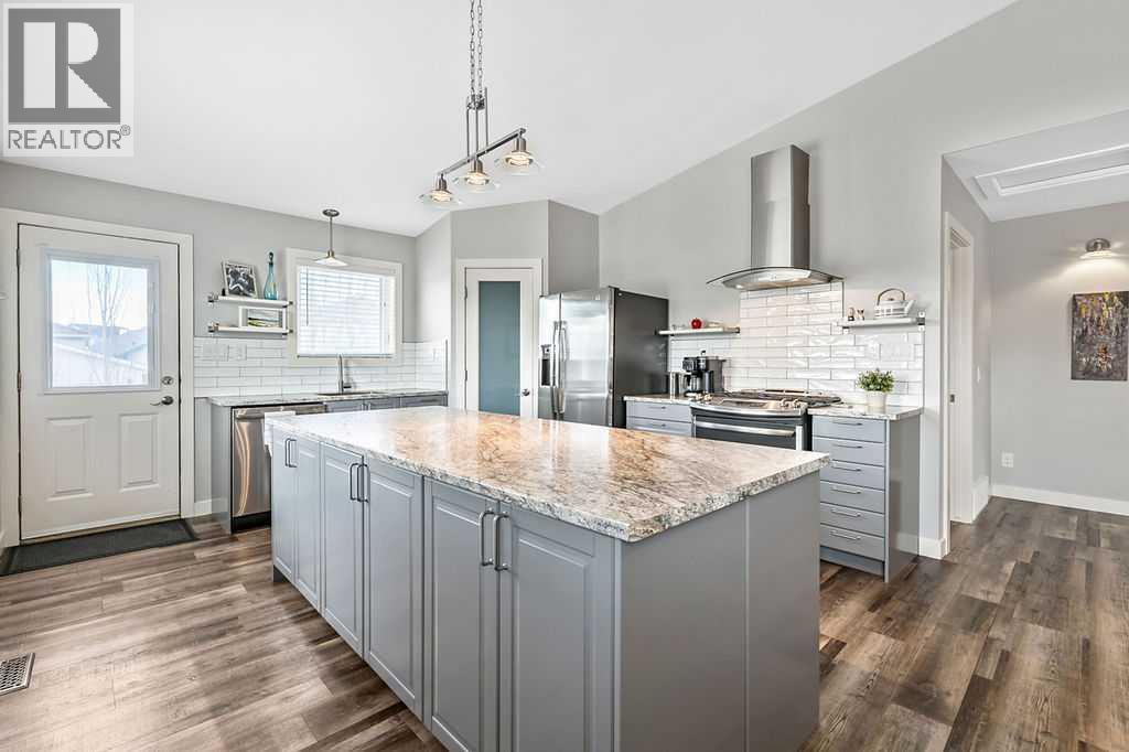 63 Cimarron Meadows Road, Okotoks, Alberta T1S 1W1 - Photo 8 - A2296352