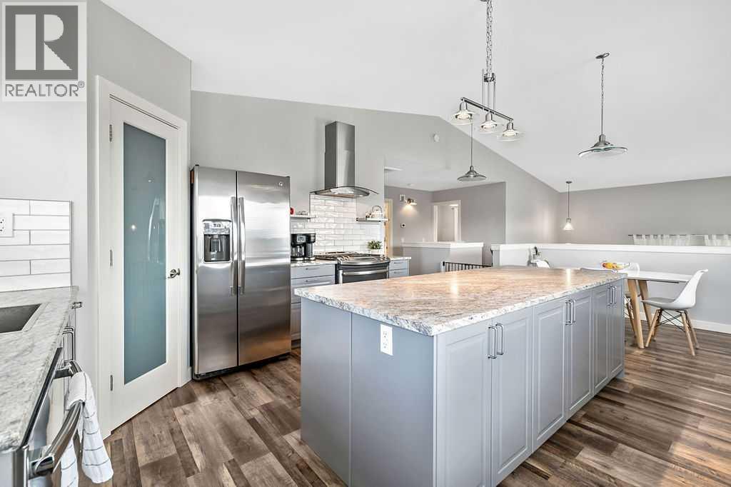 63 Cimarron Meadows Road, Okotoks, Alberta T1S 1W1 - Photo 9 - A2296352