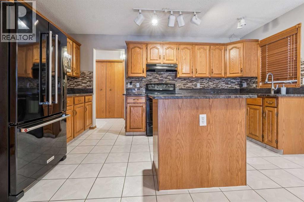 7117 California Boulevard NE, Calgary, Alberta  T1Y 6V4 - Photo 2 - A2287644