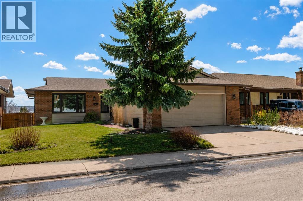 7715 67 Avenue Nw, Calgary, Alberta  T3B 4B2 - Photo 1 - A2308873