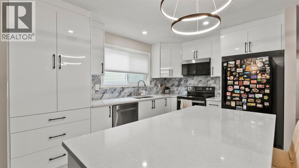 2416 Woodview Drive Sw, Calgary, Alberta  T2W 4X7 - Photo 7 - A2308861