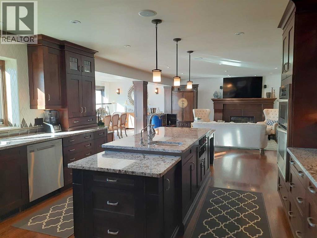 16021 Mckenzie Lake Way Se, Calgary, Alberta  T2Z 1Y1 - Photo 11 - A2297710