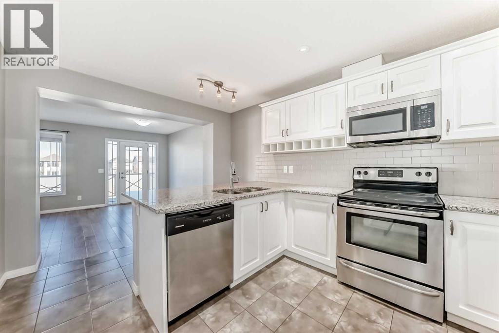 147 Windford Crescent Sw, Airdrie, Alberta  T4B 4G4 - Photo 6 - A2300067