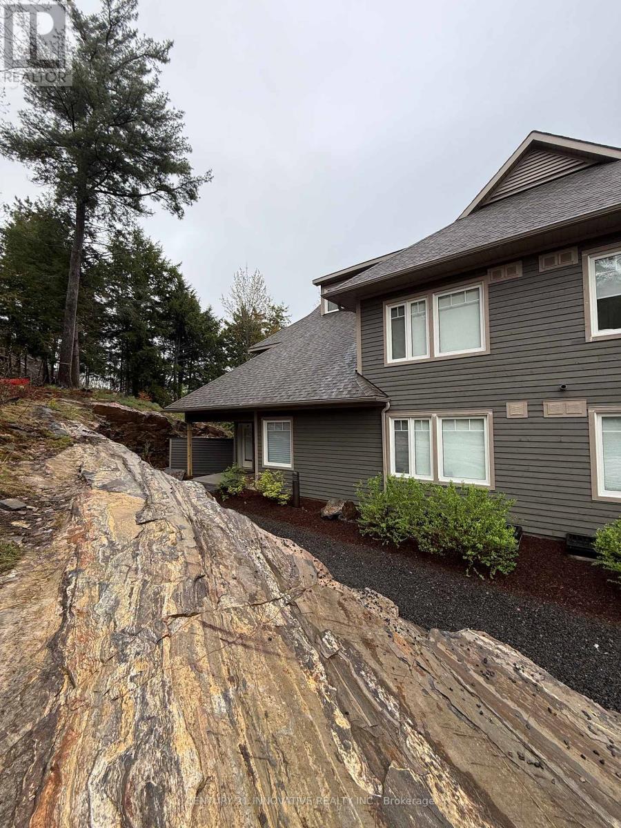 104 - 13 TREE TOPS LANE, Huntsville, Ontario