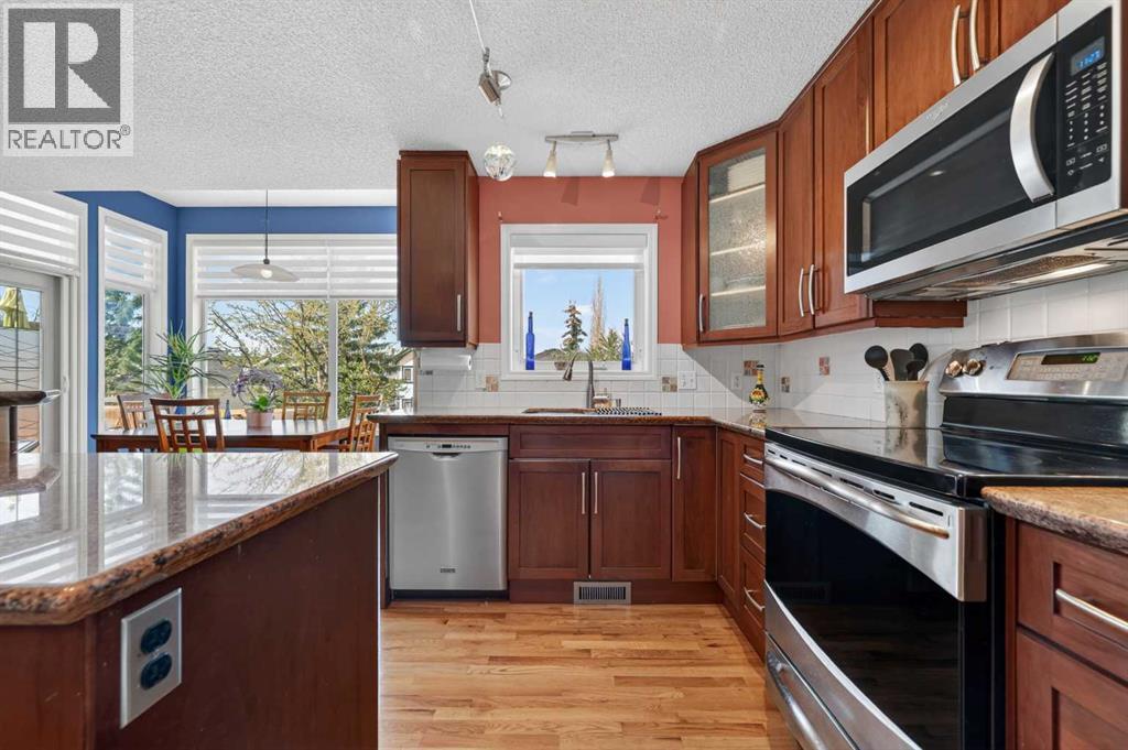 230 Rocky Ridge Cove Nw, Calgary, Alberta  T3G 4L1 - Photo 15 - A2303867