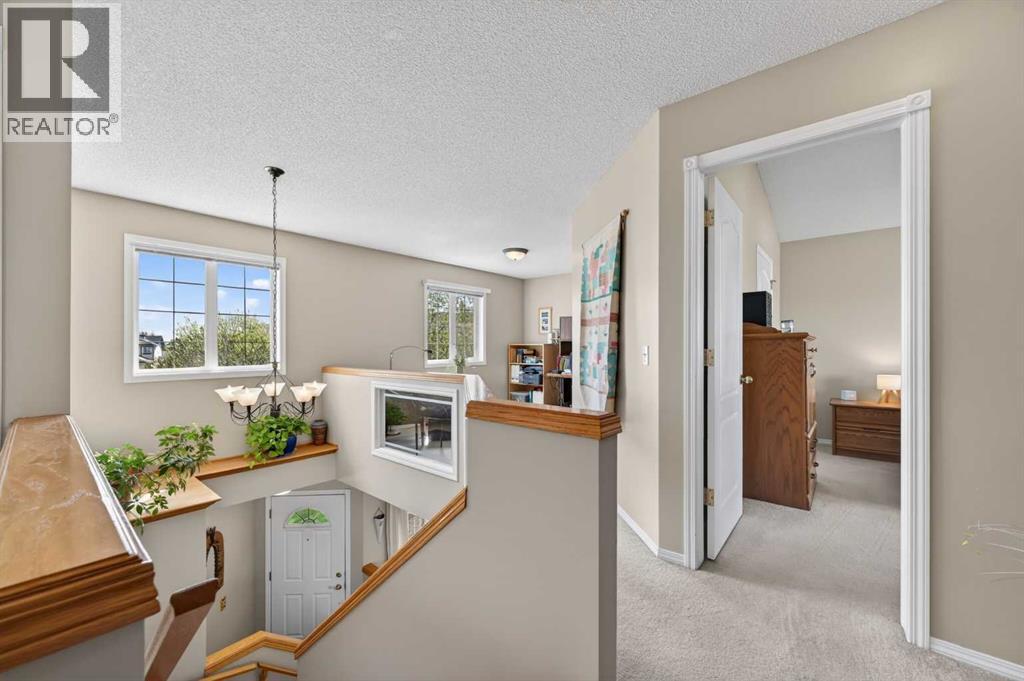 230 Rocky Ridge Cove Nw, Calgary, Alberta  T3G 4L1 - Photo 23 - A2303867