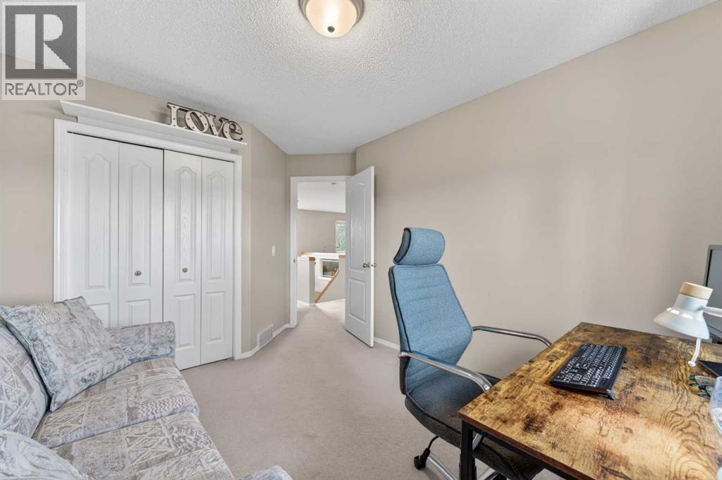 230 Rocky Ridge Cove Nw, Calgary, Alberta  T3G 4L1 - Photo 33 - A2303867