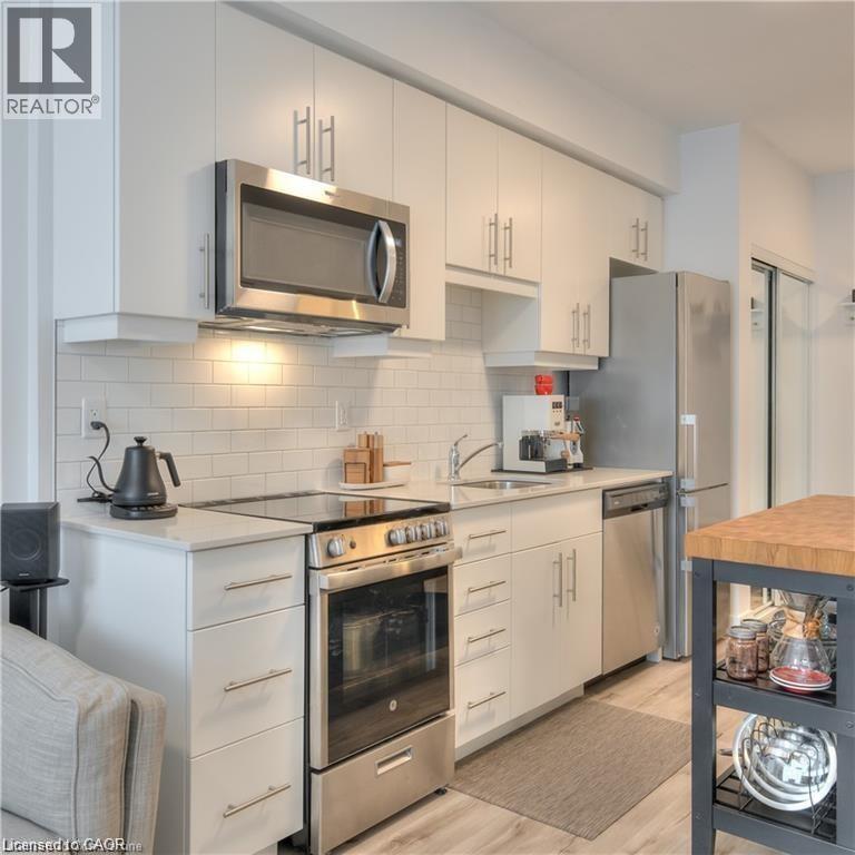 247 Northfield Drive E Unit# 207, Waterloo, Ontario  N2K 0H1 - Photo 2 - 40829385