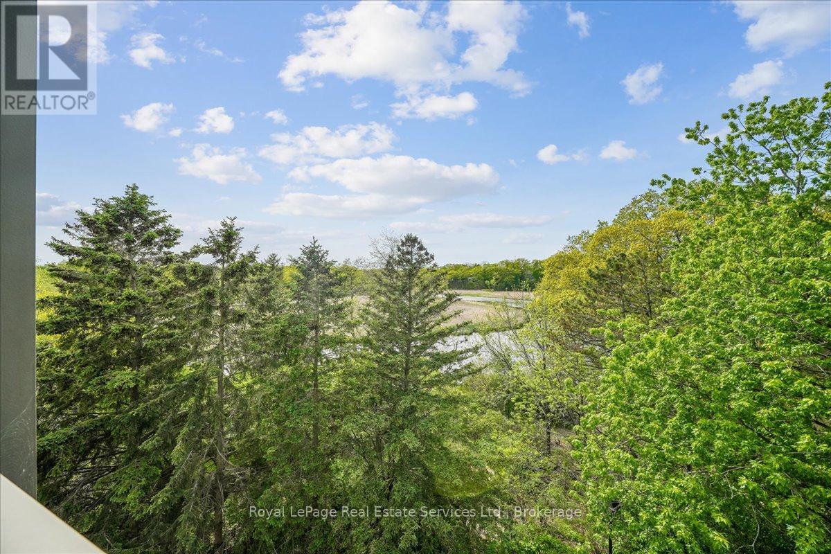 405 - 2511 Lakeshore Road W, Oakville, Ontario  L6L 6L9 - Photo 1 - W13170894