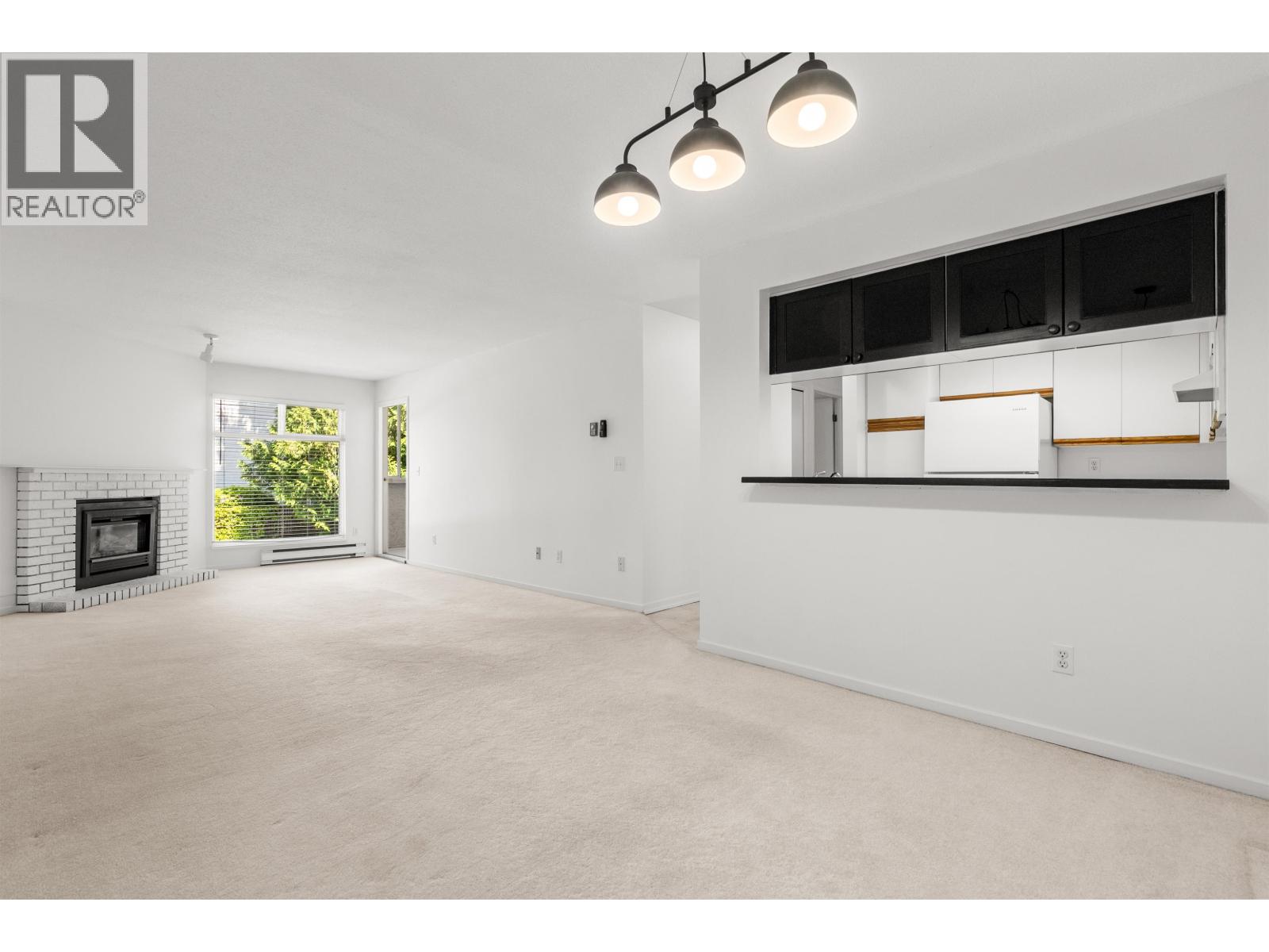 256 1440 Garden Place, Delta, British Columbia V4M 3Z2 - Photo 2 - R3127392